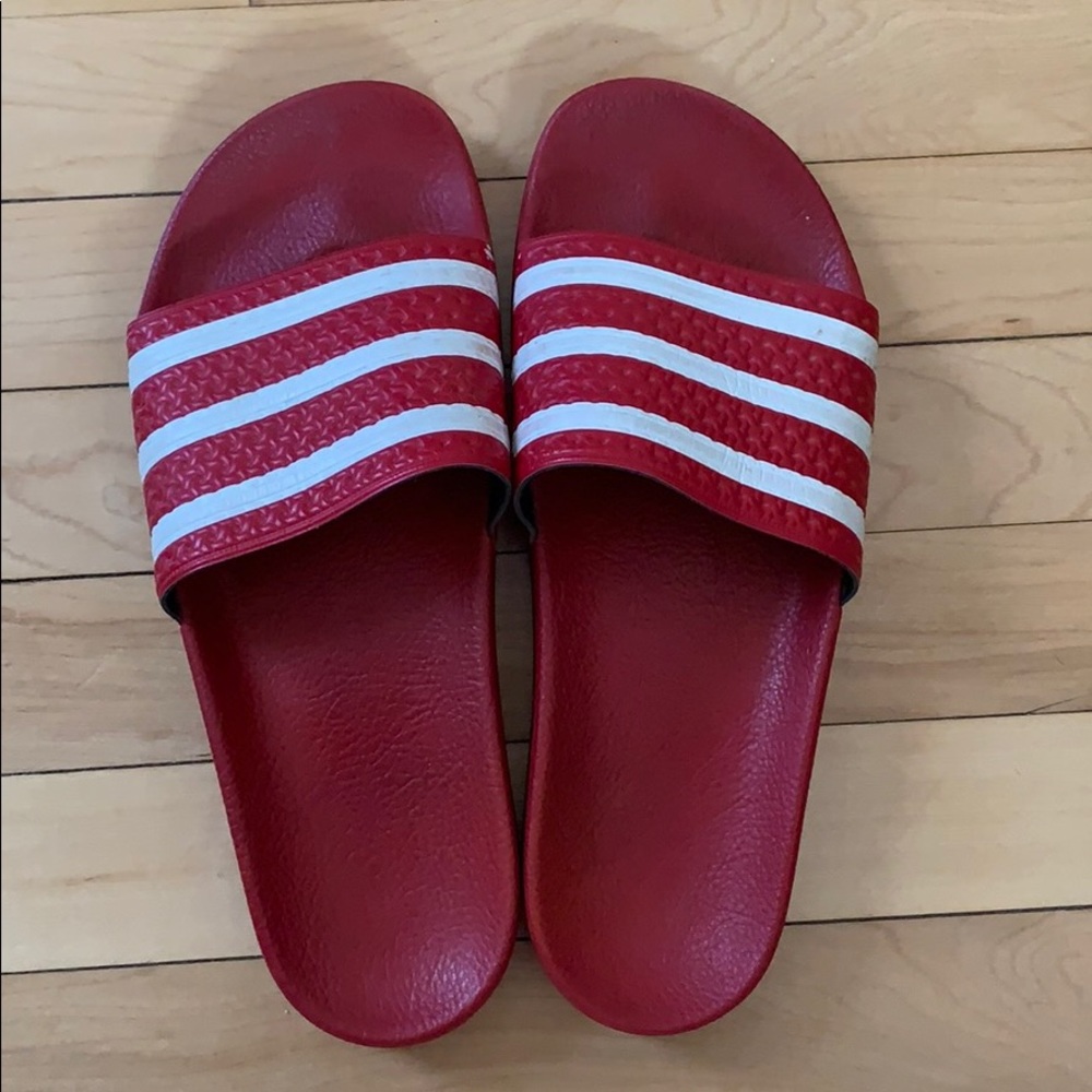 Red adidas slides